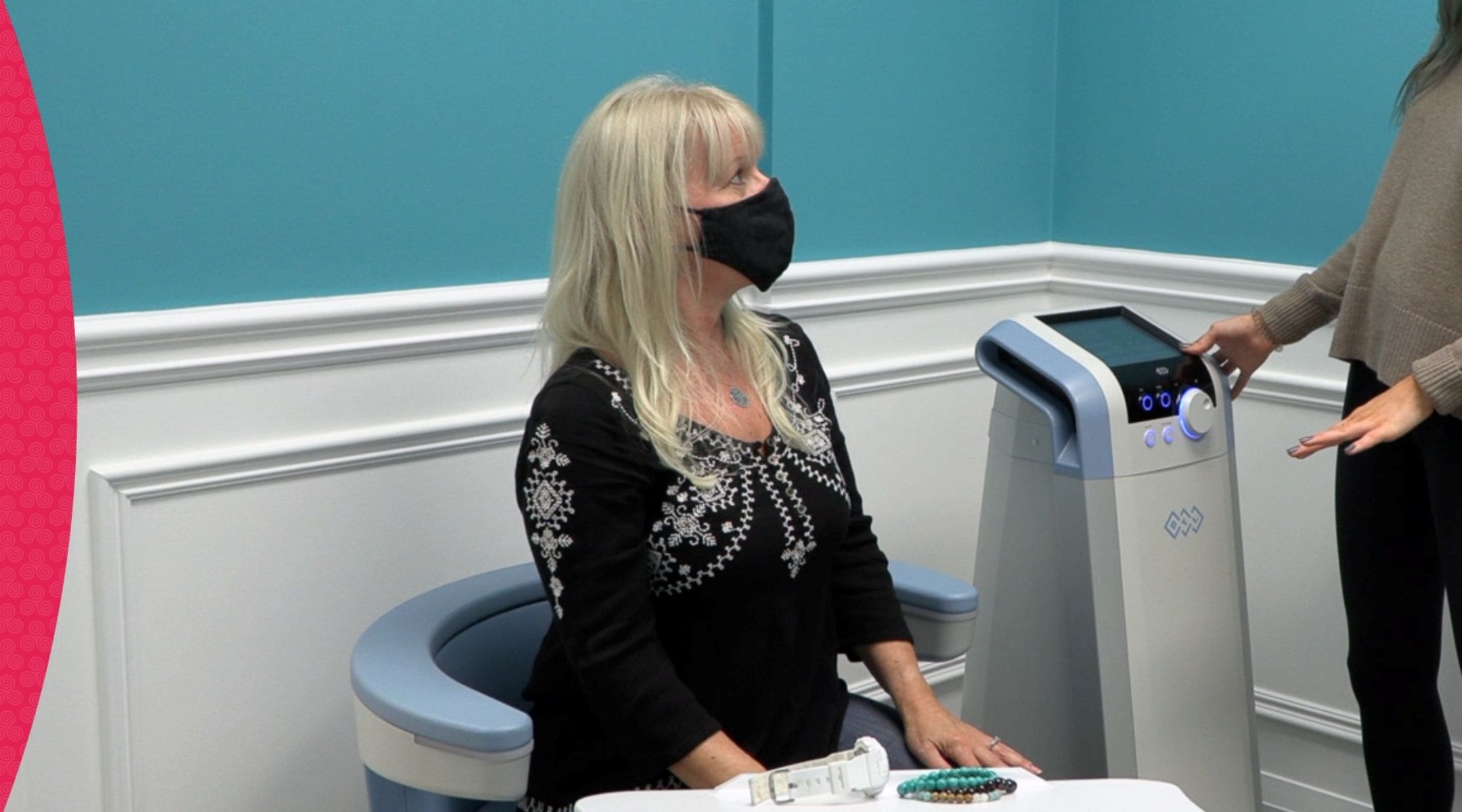 Client receiving Libby Chair pelvic therapy on the Emsella chair